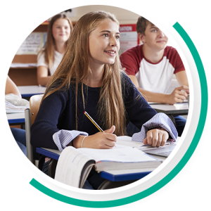 Group of students in a classroom listening attentively