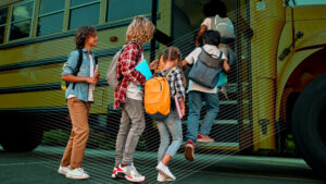 Children near school bus