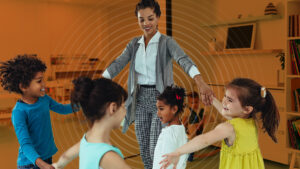 a teacher playing in a circle with young children