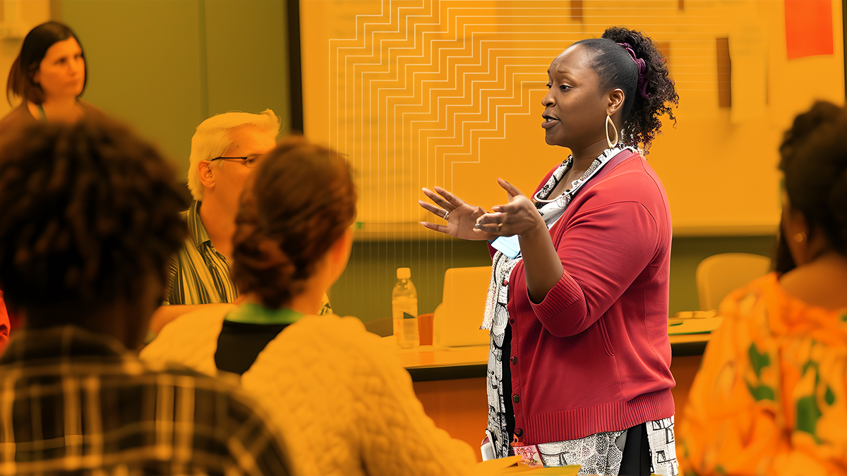 Blog header image depicting a teacher leading a group of adults in a safety training session.