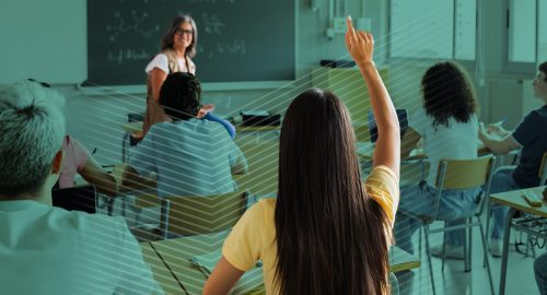 a student raising her hand in class to use a digital hall pass